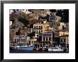Buildings Overlooking The Harbour, Symi Island, Greece by Izzet Keribar Limited Edition Print