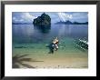 Bangka (Boat) Leaves Shores Of Malapacao Island, Bacuit Archipelago, Palawan, Philippines by John Pennock Limited Edition Print