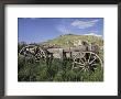 Old Wood Wagon Near Mining Ghost Town At Bannack State Park, Montana, Usa by John & Lisa Merrill Limited Edition Print