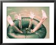 Legs And Feet Of A Child In Pool's Tube by Maria Taglienti Limited Edition Print