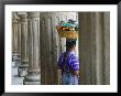 Woman Carrying Basket With Colonial Styled Pillars, Antigua, Guatemala by Keren Su Limited Edition Print