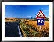 Speed Sign On Winding Road Near San Quirico D'orica, Tuscany, Italy by David Tomlinson Limited Edition Print