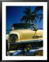 Old Yellow Chevrolet, Parked By The Ocean, Varadero, Matanzas, Cuba by Martin Llado Limited Edition Print