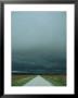 Spring Storm Blows In Across A Gravel Road by Stephen Alvarez Limited Edition Pricing Art Print