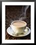 A Steaming Cup Of Coffee On Coffee Beans by Peter Sapper Limited Edition Print