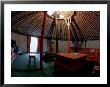 Yurt And Traditional Furniture, Golden Eagle Festival, Mongolia by Amos Nachoum Limited Edition Print