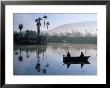 Two People Fishing In Boat At Dawn, Lake San Marcos, California, Usa by Jeff Greenberg Limited Edition Print