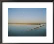 Scenic View Of A Moonrise Over A Placid Body Of Water by Jason Edwards Limited Edition Print