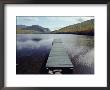 A Scenic View Of A Dock On A Lake by Bill Curtsinger Limited Edition Print