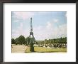 View Of The Eiffel Tower From A Park by W. Robert Moore Limited Edition Pricing Art Print