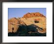 A Hikers Shadow Falls Upon A Rock Face Near The Rainbow Trail In Utah by Bill Hatcher Limited Edition Print