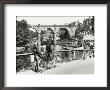 Two Cyclists Take A Break On A Bridge Over The River Nidd At Knaresborough by Fred Musto Limited Edition Print