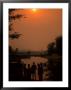 People On Banks Of Zambezi River, Zambia by Roger De La Harpe Limited Edition Print