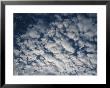 A View Of A Cloud-Filled Sky by Raul Touzon Limited Edition Print