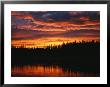 Sunset Is Reflected In The Mackenzie River by Raymond Gehman Limited Edition Print