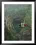 A Biologist Ascends Tawi Attair, A 200-Meter Deep Sinkhole by Stephen Alvarez Limited Edition Print
