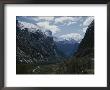 Snow-Capped Mountains Behind Winding Road by Todd Gipstein Limited Edition Pricing Art Print