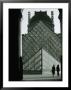 Looking Through An Arched Entrance Of The Musee Du Louvre Towards The Glass Pyramid, Paris, France by Mark Newman Limited Edition Print