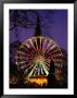 Scott Monument And Christmas Ferris Wheel In Princes Street Gardens, Edinburgh, United Kingdom by Jonathan Smith Limited Edition Print