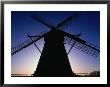 A Windmill In Silhouette In Skane,Skane, Sweden by Anders Blomqvist Limited Edition Print
