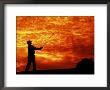 Man Swinging Golf Club At Sunset by Bill Bachmann Limited Edition Print