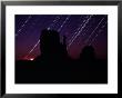 Star Streaks Above The Silhouetted Mitten Buttes by Michael Nichols Limited Edition Pricing Art Print