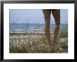 Legs Of A Woman Standing On A Dune Overlooking The Mediterranean by Taylor S. Kennedy Limited Edition Print