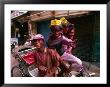 Group On Rickshaw Celebrating Holi Festival, Delhi, India by Paul Beinssen Limited Edition Print