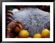Oranges Hanging From Piercings On A Devotee's Back, Thaipusam Festival, Singapore, Singapore by Michael Coyne Limited Edition Print