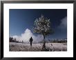 Steam Rises Behind A Man In A Frost-Covered Pocket Basin Field by Raymond Gehman Limited Edition Print