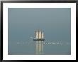 Three-Masted Schooner Shown With Swans In The Early Morning Light by Sisse Brimberg Limited Edition Pricing Art Print