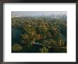 Aerial View Of Central Park And The Manhattan Skyline In The Fall by Melissa Farlow Limited Edition Pricing Art Print