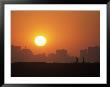 Fishermen Against Long Beach Skyline, Sunset, Ca by Doug Mazell Limited Edition Print