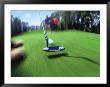 Blurred Image Of People Playing Golf by Chuck Carlton Limited Edition Pricing Art Print