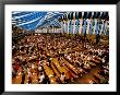 Overhead Of Oktoberfest Drinking Session In Theresienwiede Fairgrounds Beer Tent, Munich, Germany by Krzysztof Dydynski Limited Edition Print