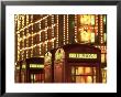 Telephone Booths In Front Store, London, England by Walter Bibikow Limited Edition Print