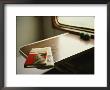 English Version Of A Biography Of Mao Sits On A Table In A Train by Eightfish Limited Edition Print