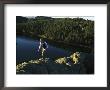 Young Woman Hiking A Rocky Rim Above Sylvan Lake by Bobby Model Limited Edition Pricing Art Print