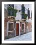 Residential Side Street Decorated With Flowers, Venice, Italy by Dennis Flaherty Limited Edition Print