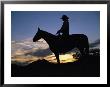 A Cowboy Silhouetted Against A Sunset At This Western Movie Location by Stephen St. John Limited Edition Print