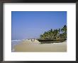 Palm Trees And Fishing Boats, Colva Beach, Goa, India by Jenny Pate Limited Edition Print