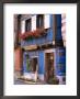 Blue House With Windowbox Full Of Geraniums, Niedermorschwihr, Haut-Rhin, Alsace, France by Ruth Tomlinson Limited Edition Print