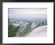 Mountain Climber Hikes Along A Mountain Ridge In Denali by Bill Hatcher Limited Edition Print