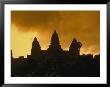 Silhouetted Temples Of Angkor Wat At Dusk by Richard Nowitz Limited Edition Print