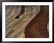 Tractor Ploughing Field Near Anthony, Kansas, Usa by Jim Wark Limited Edition Print