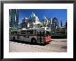 Typical Red And White Bus, Robson Square, Vancouver, British Columbia, Canada by Ruth Tomlinson Limited Edition Print