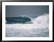 Surfer Riding A Wave In The Bonsai Pipeline In Oahu by Todd Gipstein Limited Edition Print