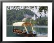 Oars On Traditional Wooden Pletnja Rowing Boat Moored By Jetty by Pearl Bucknall Limited Edition Print