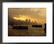 Ferries Silhouetted On The Harbour At Sunset, Hong Kong by Richard I'anson Limited Edition Print