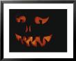 Silhouette Of A Smiling Face On A Jack-O-Lantern by Stephen Sharnoff Limited Edition Print